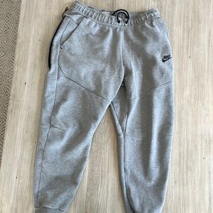 Nike tech youth large sweatpants. Grey. Good shape. No tears or stains.
